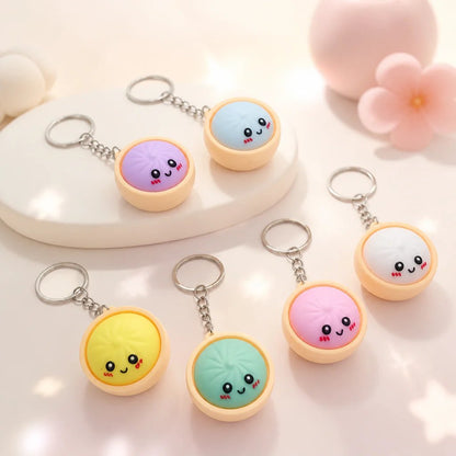 🔥🎁 LAST DAY BUY 2 GET 2 FREE🔥  Cute Dumpling Pressable Fidget Keychain - touch sensing light